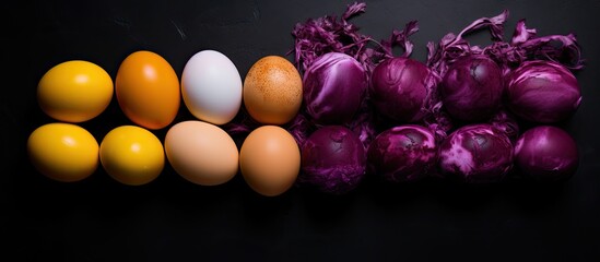 Eggs dyed with beets purple cabbage turmeric and coffee create a colorful copy space image