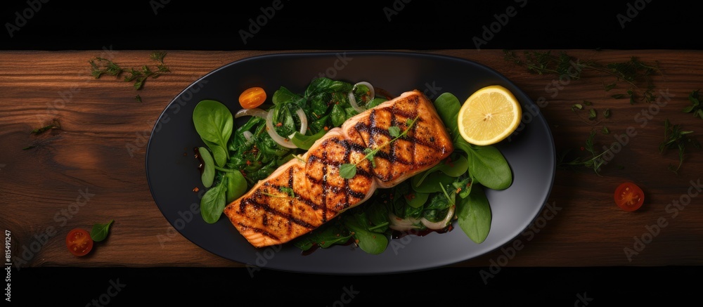 Aufkleber Top view of a grilled salmon dish with a side of spinach perfect for showcasing in a copy space image