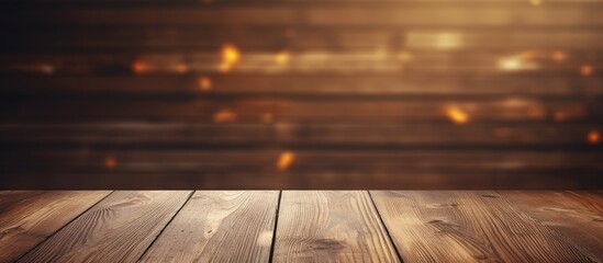 A vintage style wooden table top is placed on a wooden plank background with empty space available for text or images. Creative banner. Copyspace image