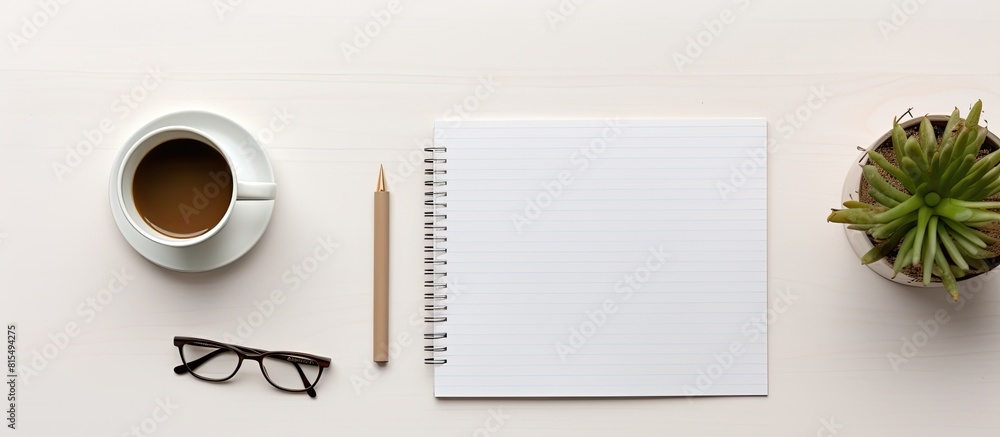 Poster a top down view of a creative workspace desk styled as a minimalistic and aesthetically pleasing fla