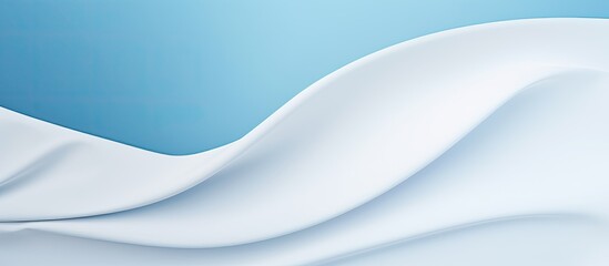 Obraz premium A white sheet of paper is placed on a blue background providing ample copy space for text The image showcases a print design concept