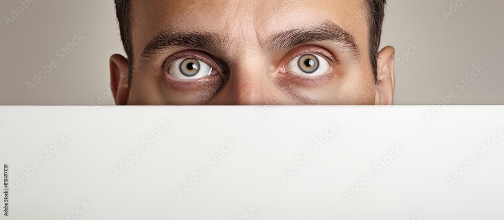 Poster close up of a man s forehead against a white panoramic banner backdrop with plenty of copy space ima