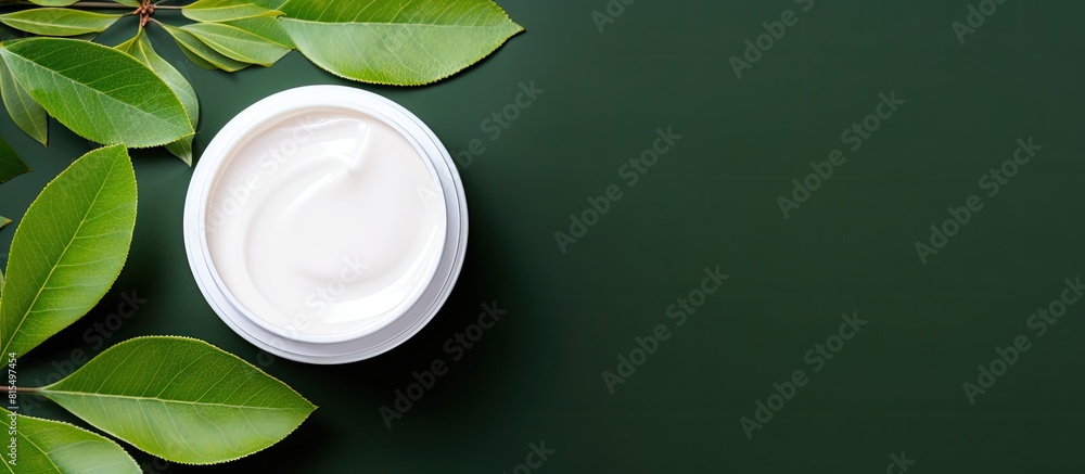 Sticker Branding mock up concept featuring white cosmetic products and green leaves on a colorful background Copy space image for showcasing natural beauty products