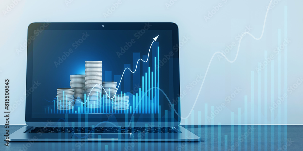 Poster Close up of laptop on desk with creative hologram with growing chart and stacked coins and mock up place. Financial growth and investment concept. 3D Rendering.