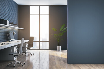 Side view of modern dark home office interior with empty mock up place on wall, workplace, window with city view and brick wall, decorative plant. 3D Rendering.