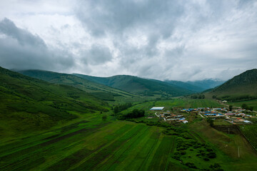Fototapeta premium Aerial photography of the road in the Huangganliang Valley of the Greater Hinggan Mountains on the Rea Line in Keshiketeng Banner, Chifeng City