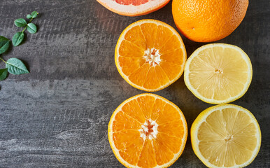 A variety of citrus fruits including lemons, grapefruit and oranges.