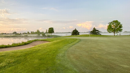 Naklejka premium Wisconsin Golf Course at Sunrise late Spring