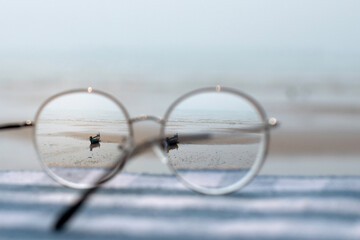 Sharp images look good when viewed with glasses, sea view through eyeglasses, selective focus and...