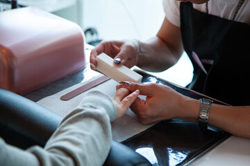 View of trimming the nail in the beauty shop