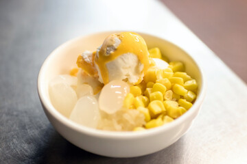 Coconut milk ice cream with egg yolk and topping; Thai dessert style.