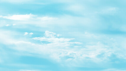 Blue pastel sky with white fluffy cloud. Summer holiday cloudy sky. Cloudscape background. Cumulus clouds. Freedom of life concept.
