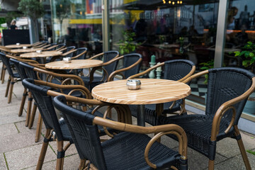 Tables of a street city cafe, summer terrace of a restaurant