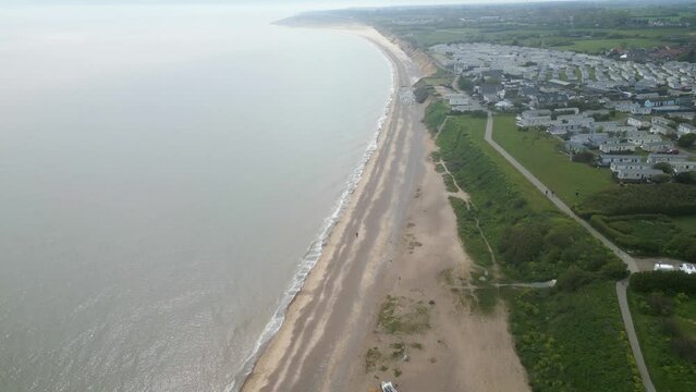 Moving drone view of Pakefield Beach in Suffolk, England, UK.