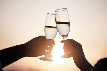 Outdoor, sunset or hands of couple toast on date in marriage commitment to travel on holiday vacation. Cheers, sky and romantic man bonding with peace or woman for care, trust and support together