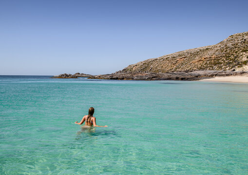 Girls swimming in beautiful clear water