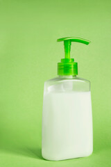 Liquid soap on green