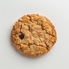 A scrumptious cookie featuring plump raisins and hearty oats, set against a pristine white backdrop