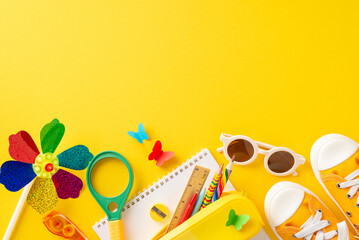 Early childhood summer education idea. Top view of learning materials - sketchbook, crayons,...