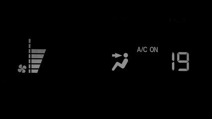 Air conditioner system signs and symbols on a vehicle