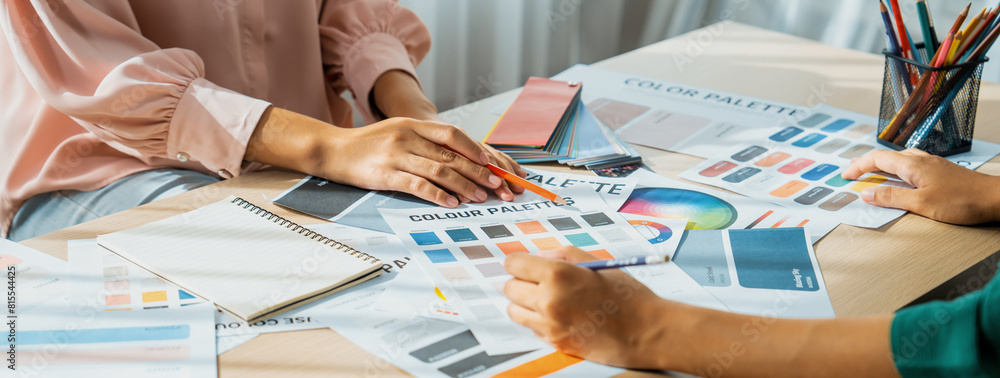 Poster cropped image of professional interior designers discuss and brainstorm main theme color in project 