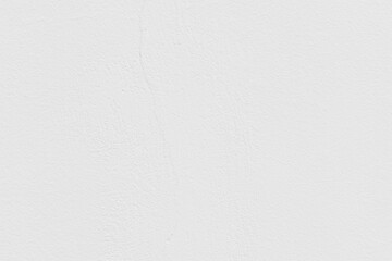 White concrete wall texture background. Uneven render stucco white cracked painted concrete wall...