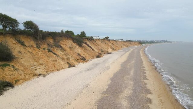 Drone shot of an empty road along Pakefield Beach in Lowestoft, England.