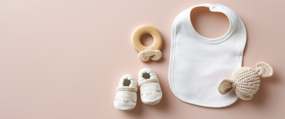 Organic Newborn Essentials including Baby Shoes, Bib, and Teether. Perfect for Branding Organic Newborn Accessories, Flat Lay, Top View.
