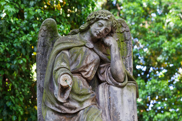 Historic Statue on the mystery old Prague Cemetery, Czech Republic