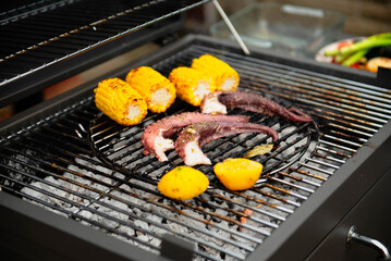 cook octopus on the grill, outside barbecue