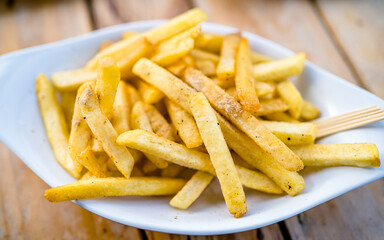 french fries on white plate