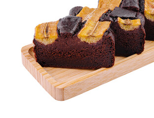 Chocolate banana bread slices on wooden board
