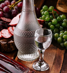 Elegant display glass of vodka on wooden table