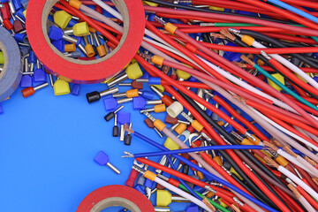 Copper electrical wiring wires in colored insulation for connecting electrical equipment. Close-up. Soft focus.