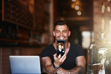 Phone screen, selfie and man at cafe with laptop for coffee shop promotion, blog or startup memory. Restaurant, business owner and entrepreneur with smartphone app for social media profile picture