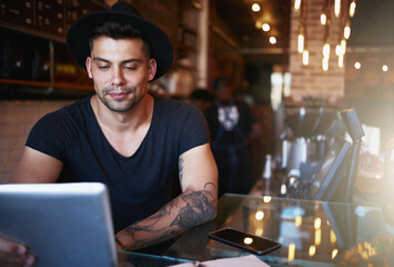 Laptop, man and coffee shop with writer working and freelancer on web article or blog. Smile,...