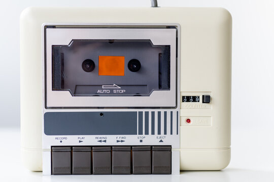 Step back in time with this vintage computer datasette, a charming relic from the 8-bit era, elegantly showcased against a clean white background.