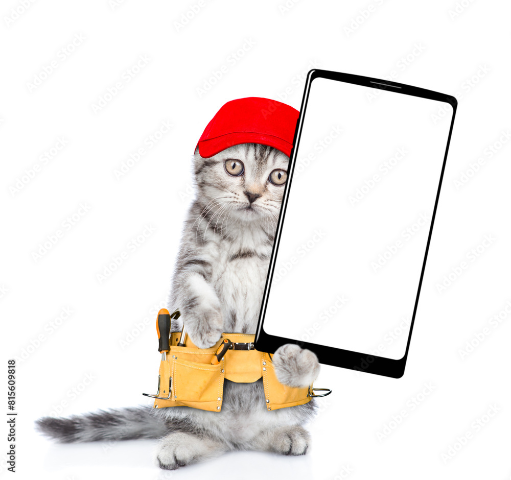 Aufkleber funny cat worker wearing red cap and toolbelt standing on hind legs and shows big smartphone with wh