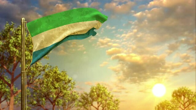 waving flag of Sierra Leone at sundown for state holiday