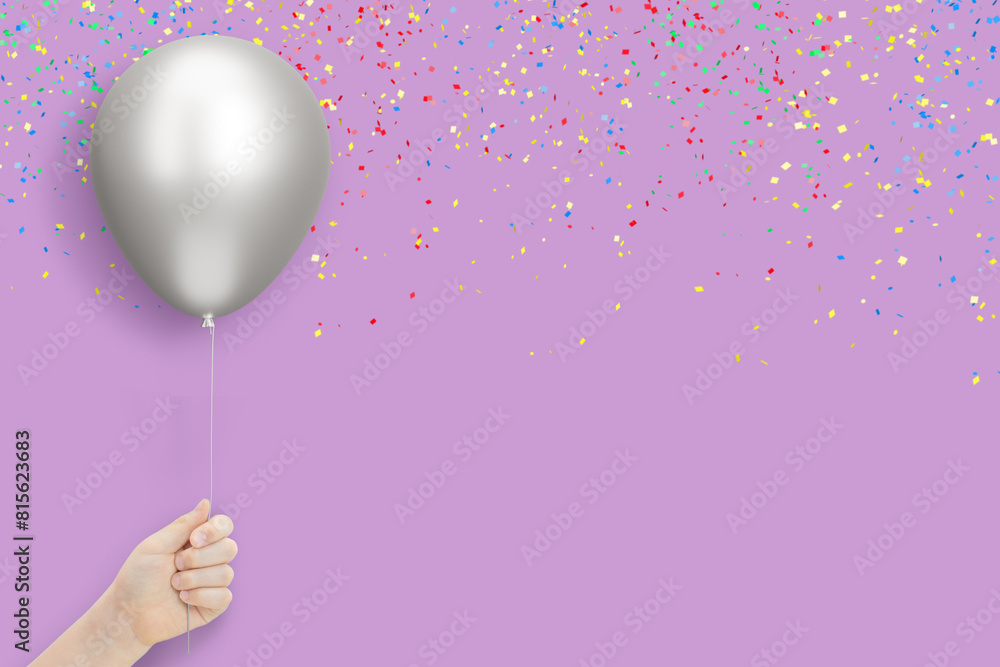 Poster female hand holds golden balloon on violet background with confetti. empty space for text