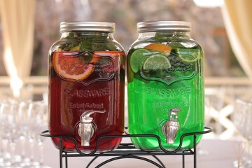 Close-up of a glass jars filled with a vibrant citrus drinks