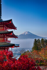 Japan Travel Destinations. Famous Kiyomizu-dera Temple Pagoda Against Kyoto Skyline  and Traditional Red Maple Trees