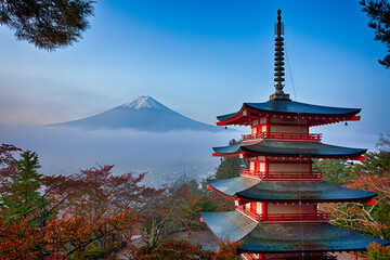 Japan Travel Destinations. Famous Kiyomizu-dera Temple Pagoda Against Kyoto Skyline  and Traditional Red Maple Trees