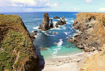 Aerial view of the dramatic Les Aiguilles de Port-Coton Cliff in France.
