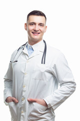 Man in Business. Image of Caucasian Professional Confident Male GP Doctor Posing in Doctor Smock And Endoscope with Hands in Pockets