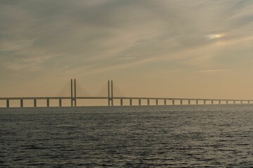 Obraz premium View of Oresund Bridge at sunset. Malmo, Sweden