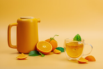 Orange tea in ceramic tea pot with ripe fruits. Refreshment seasonal drink, conceptual background