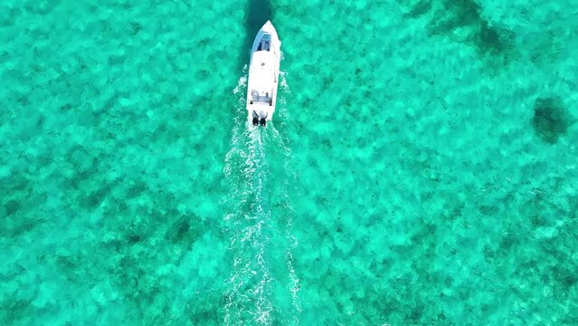Aerial Paradise: Boating the Turquoise Waters of Turks and Caicos.