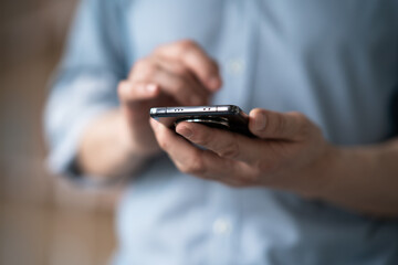 people using mobile phone in library