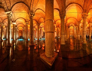 Fototapeta premium the interior of an underground passage in a cathedral with columns and arches
